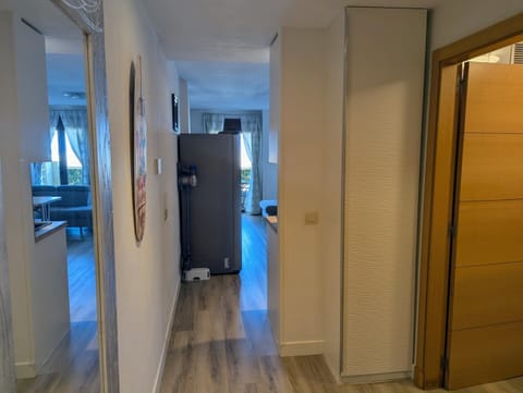 Hallway looking through to the living room and terrace