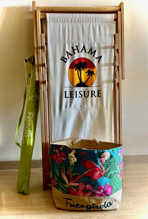 Beach bag, umbrella and towels ready for the beach